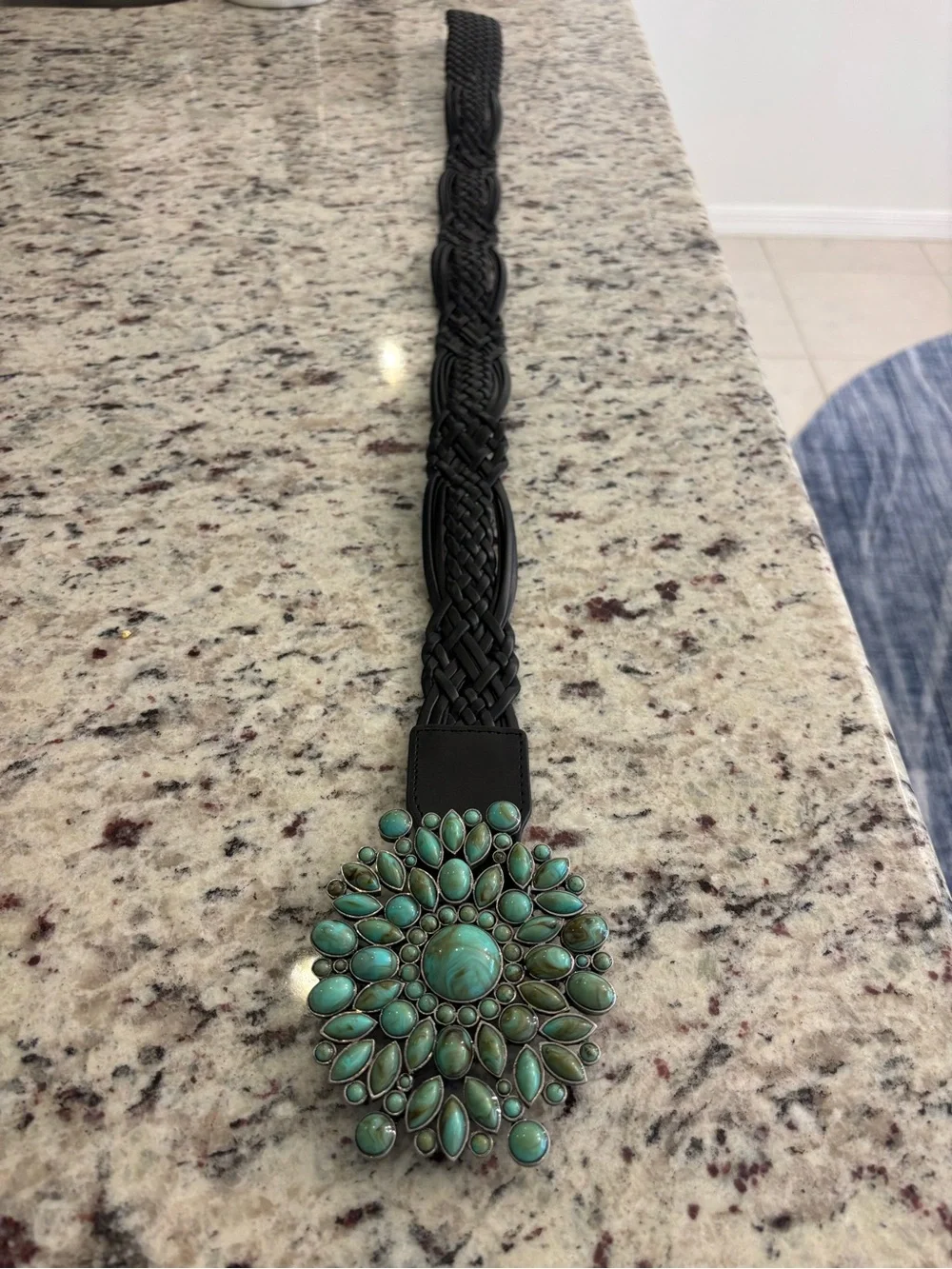 Montana Silversmith Turquoise Sunburst Belt Buckle on Black Braided Belt.